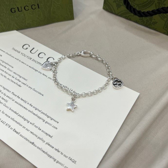 G*u*i bracelets